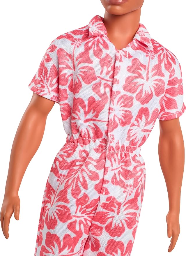 Features a white and coral Hawaiian print jumpsuit