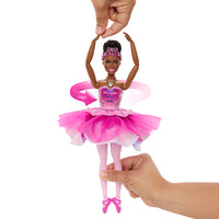 ​Lift her arms above her head and twirl her around to see a rainbow sweets