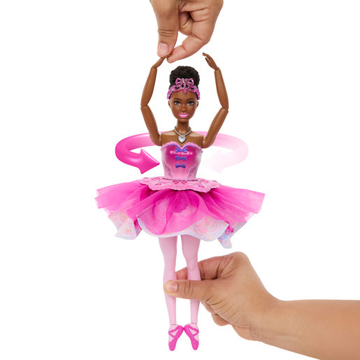 ​Lift her arms above her head and twirl her around to see a rainbow sweets