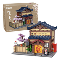 Features classic architectural details including a tiled roof, shoji screens, lattice windows and noren entrance curtain