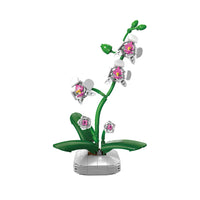 Freestanding design displayed in a plant pot