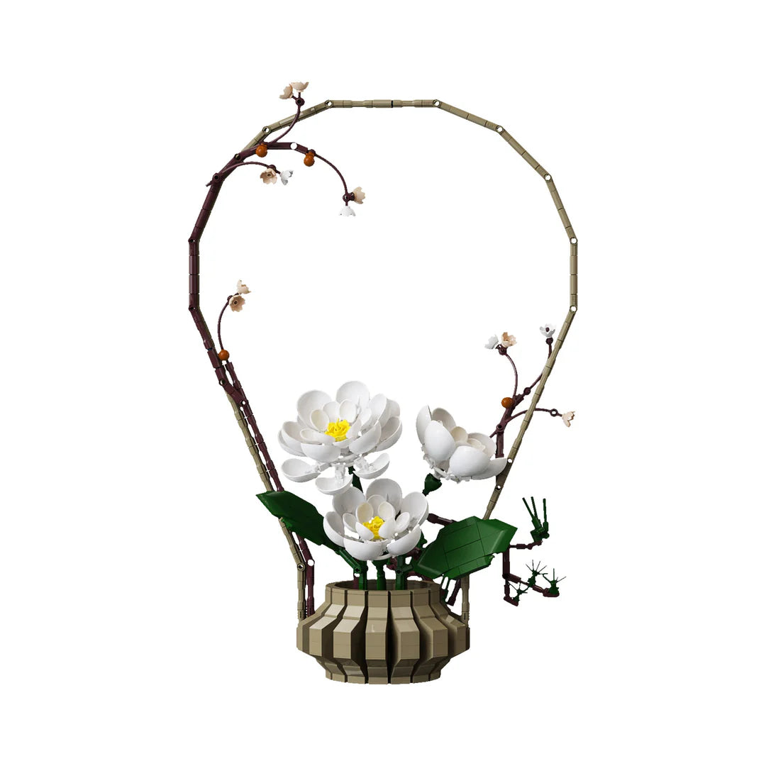 Features a freestanding floral arrangement in a decorative pot