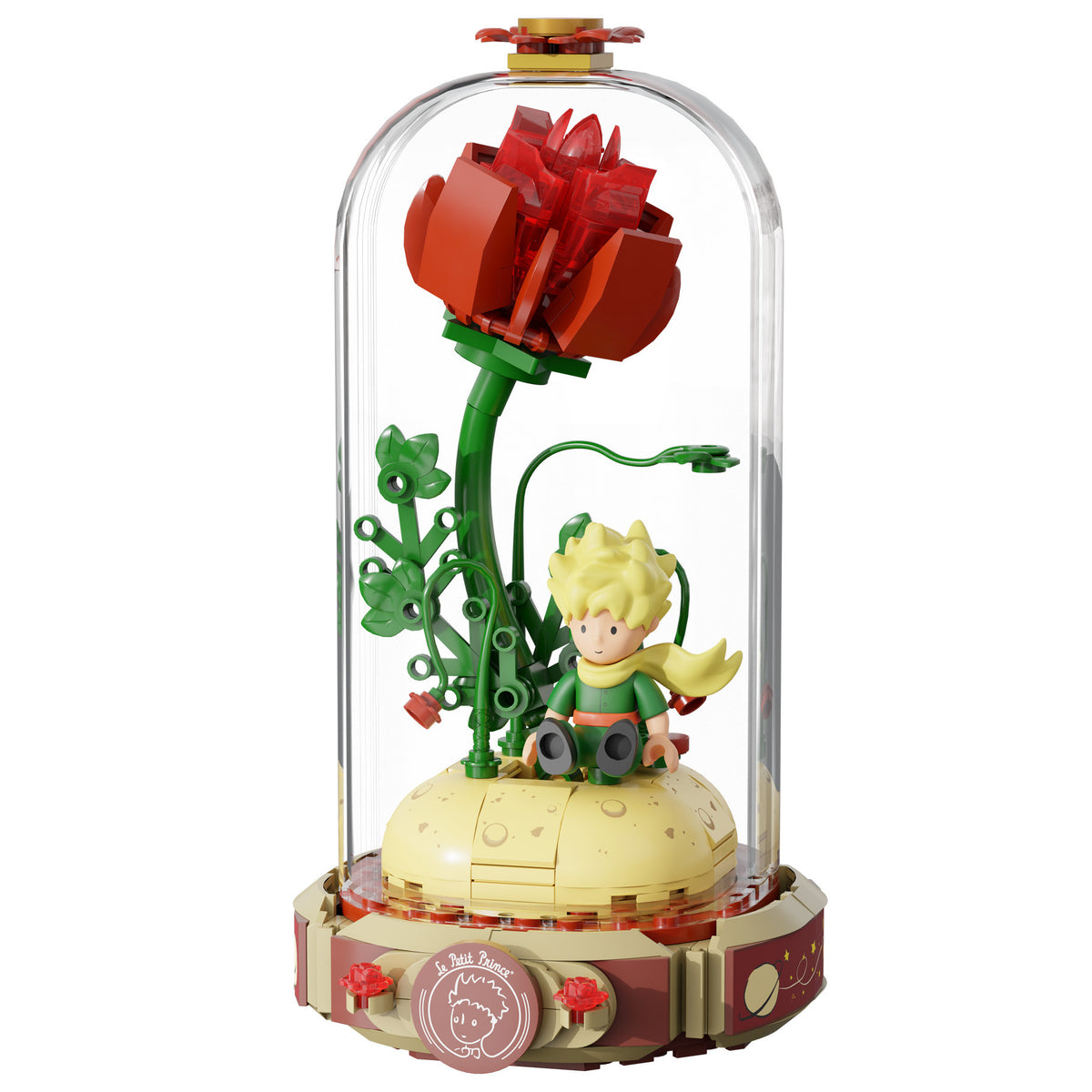 Features The Little Prince seated on a small planet with floral details