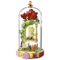 Features a rose swing, fox, and decorative landscape details