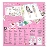 Includes 24 pages with model figures to dress up