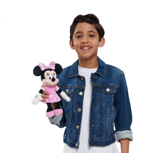 Child holding the Disney Minnie Mouse Plush 