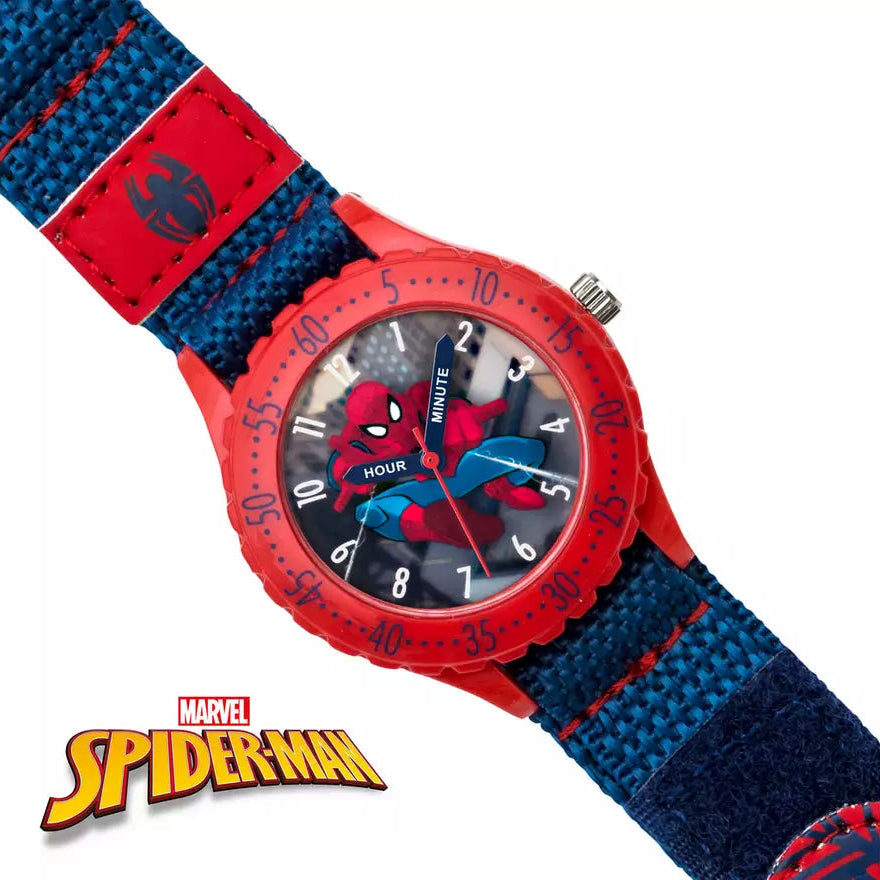 A Spider-Man themed kids' watch with a red round case, a blue and red textured fabric strap, and a Spider-Man graphic on the dial, shown on a white background with a Spider-Man logo at the bottom.